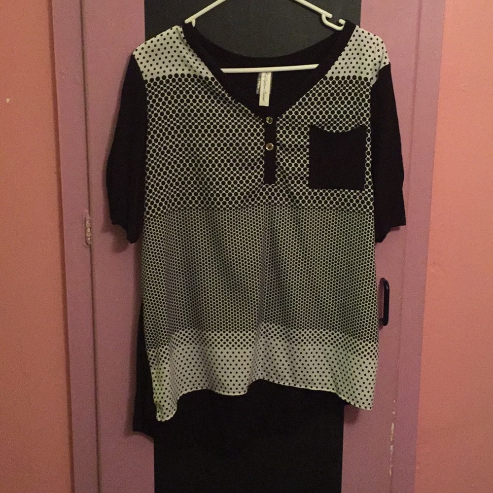 Poka-dotted black and white blouse